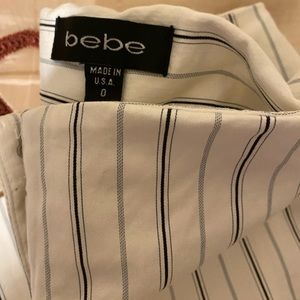 Bebe flare bottoms, size 0, White/black stripped